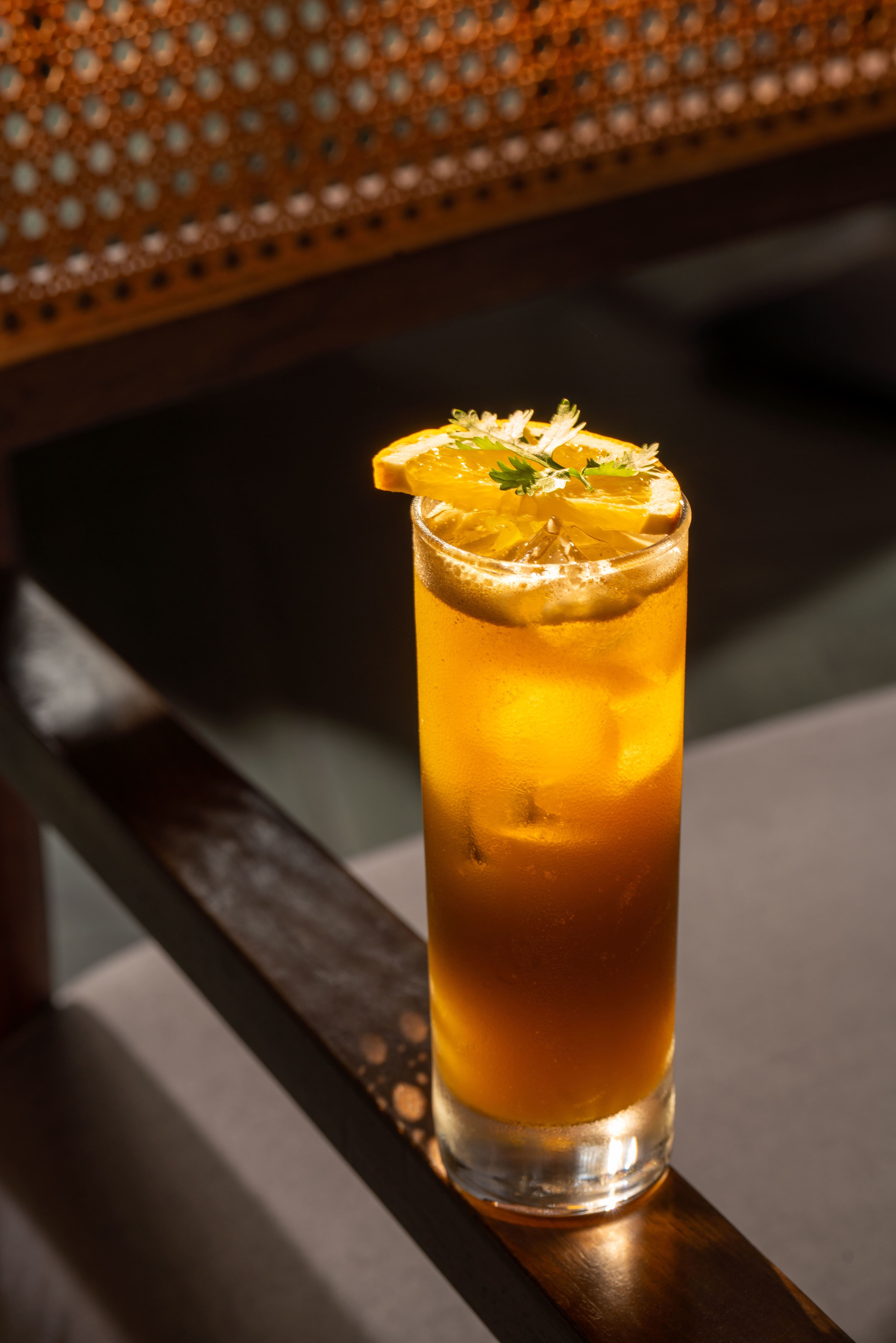 Citrus cooler on a courtyard table at Aidu Kitchen